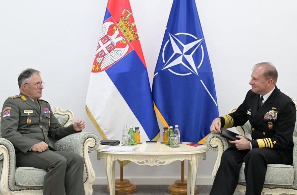 Serbian flag and the flag of Nato criminals in the same room in Belgrade. 